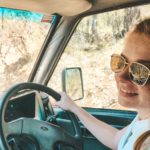 delenn smiling while in driver seat of vehicle